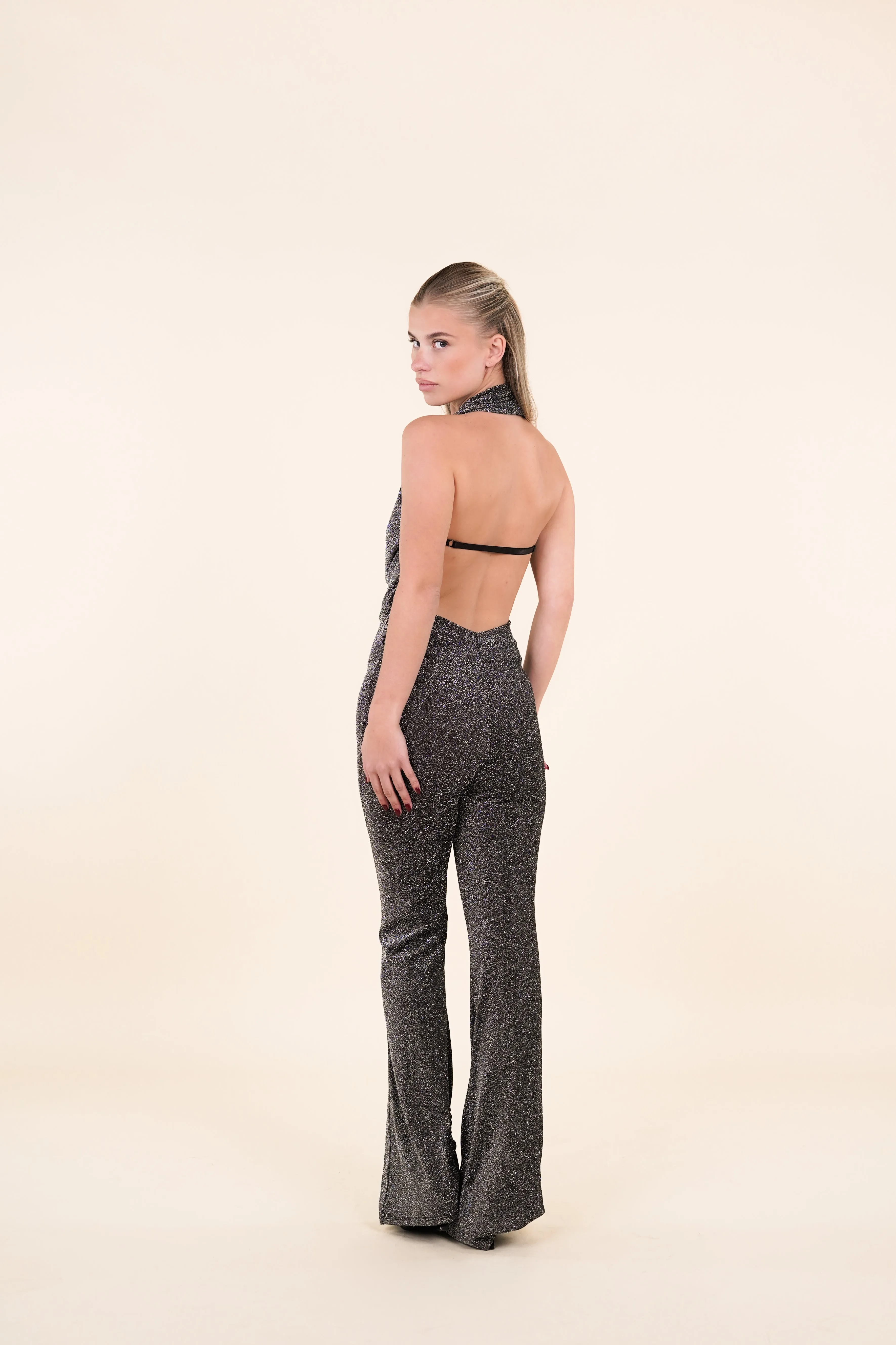 Glitter jumpsuit met open rug zilver - Lavia